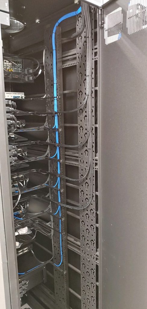 organized cabling in AV equipment rack