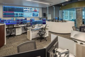 command center with large video wall and sit stand consoles