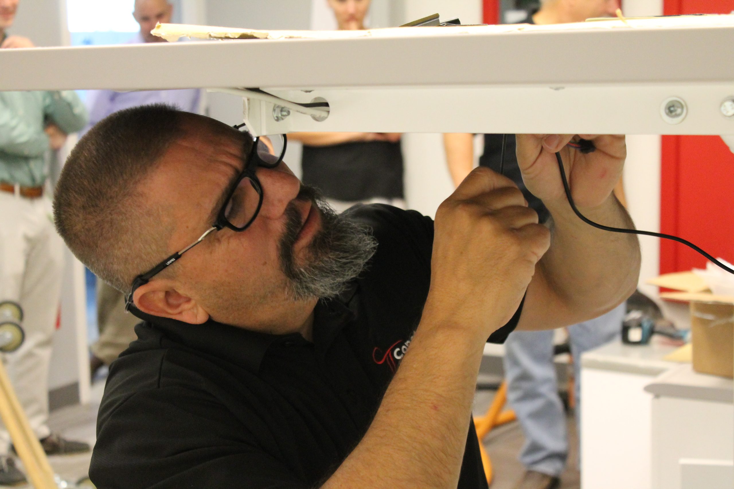 Constant employee installing console furniture