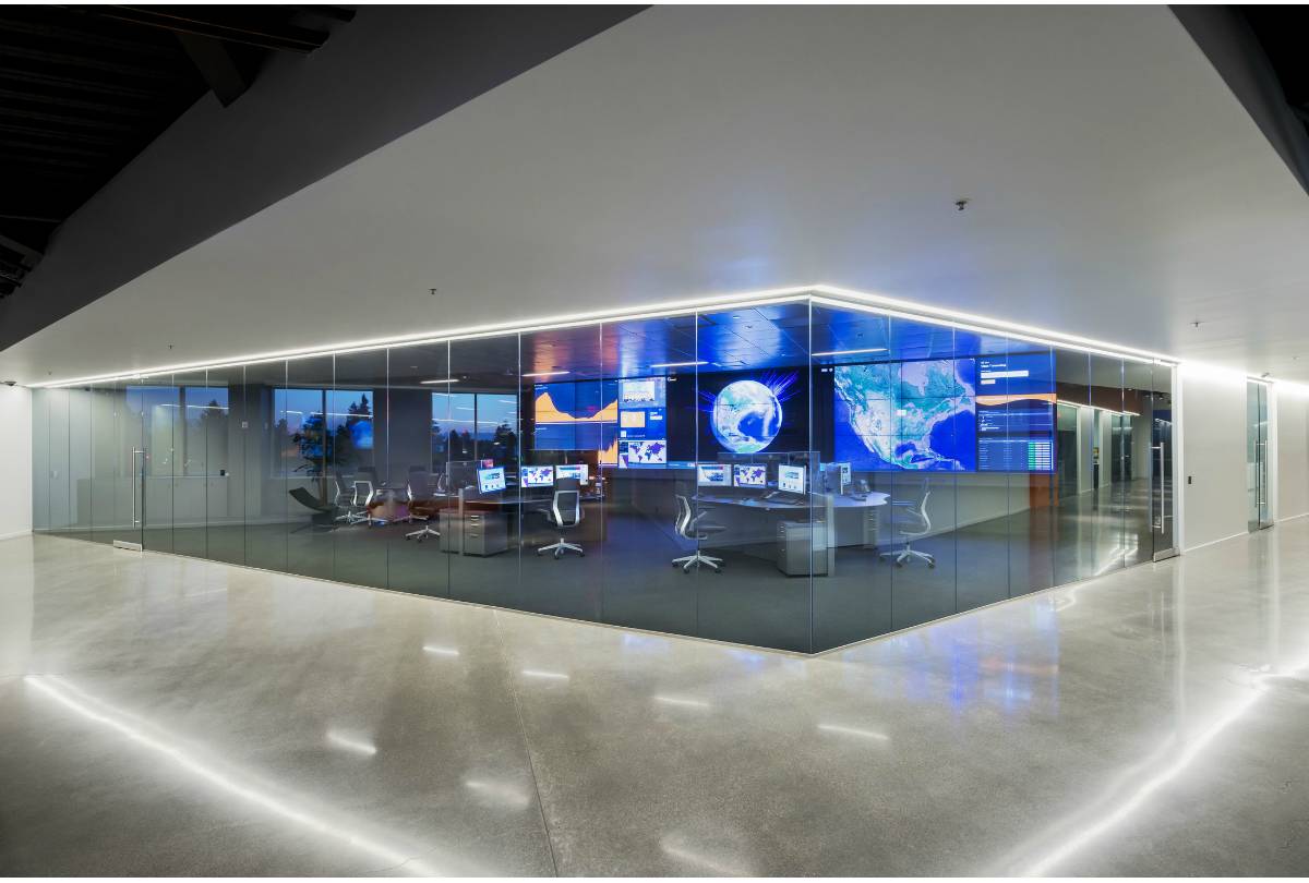 Video wall enclosed in a glass room